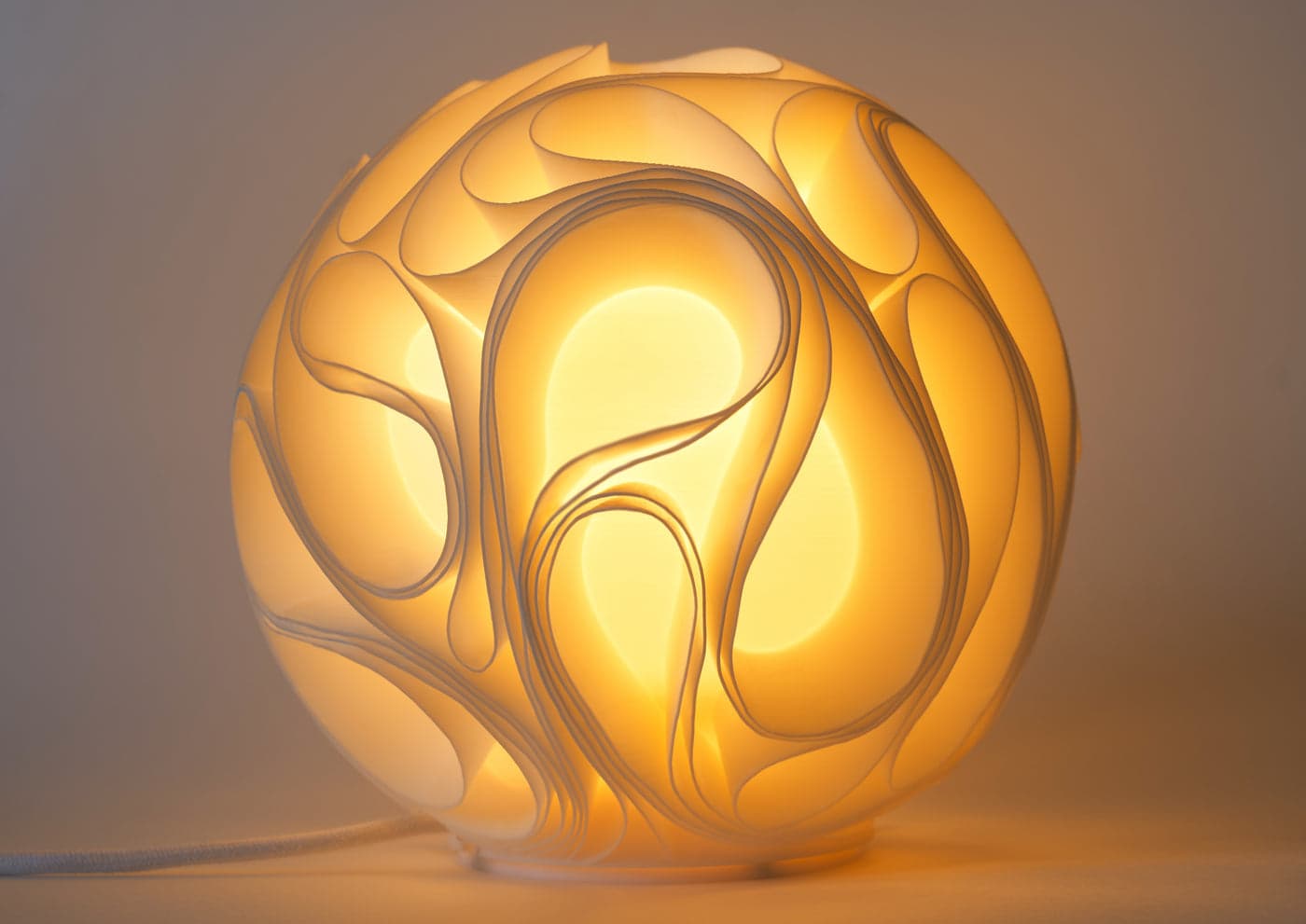 Gravity lamp, lit, close up