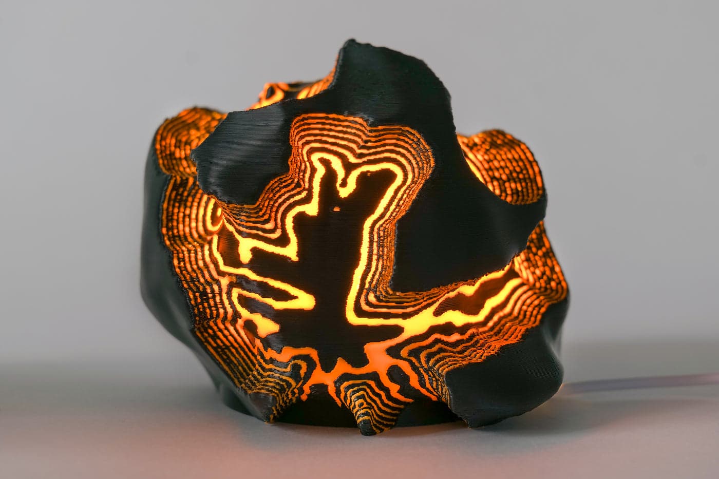 Fire mini lamp, lit, close up